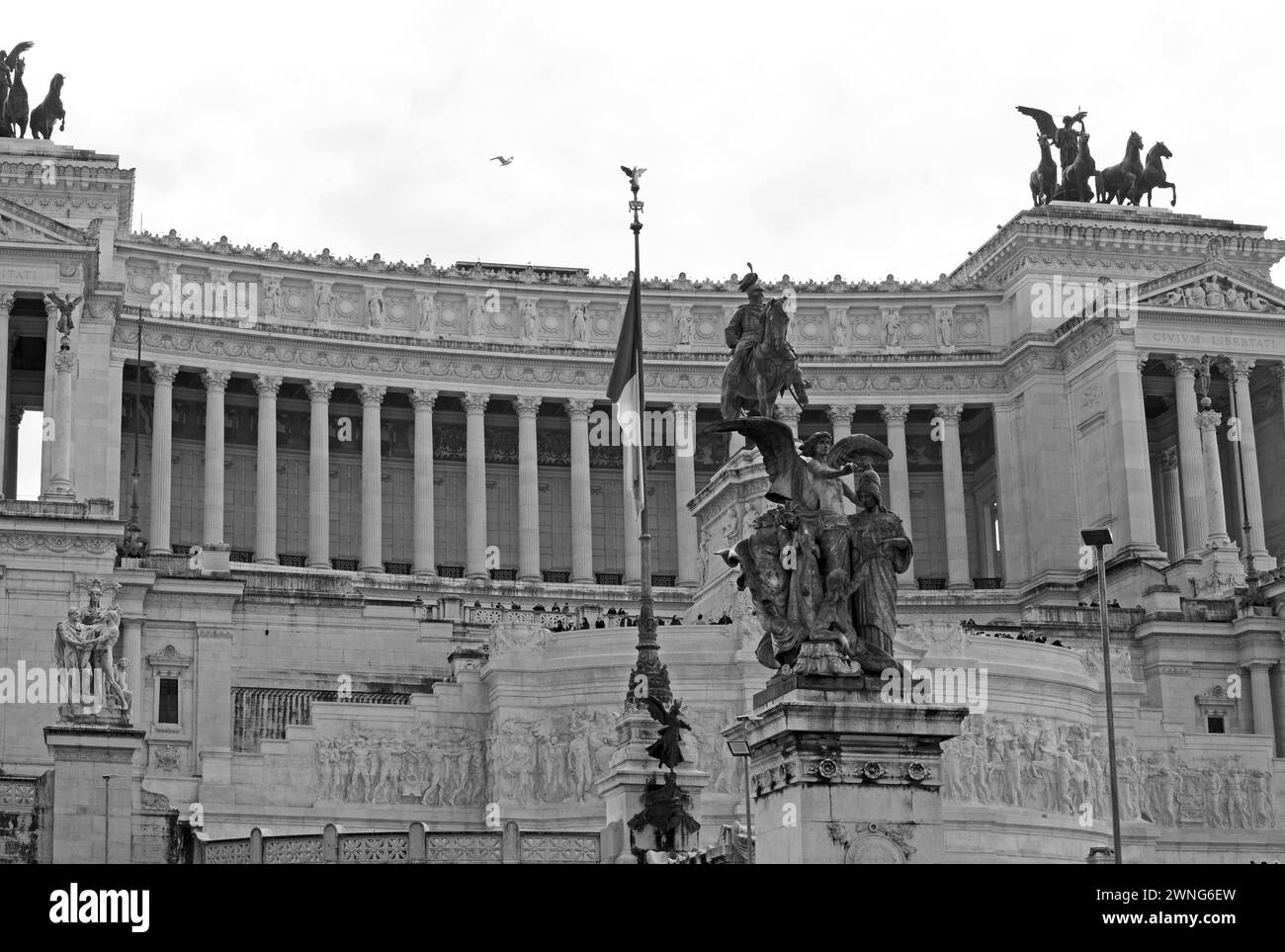 Full Framed image of the Victoria Emmanuel Memorial located in Rome.  It is a very large white marble building and has a viewing platform at the top w Stock Photo