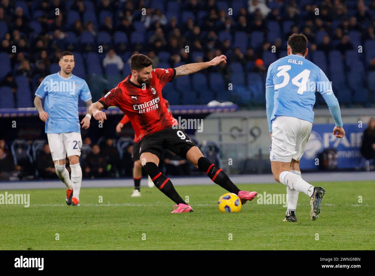 Olivier Giroud  of Milan kicks the ball during Serie A soccer match SS Lazio - AC Milan at Stadio Olimpico  on March 01, 2024 in Rome , Italy. Stock Photo