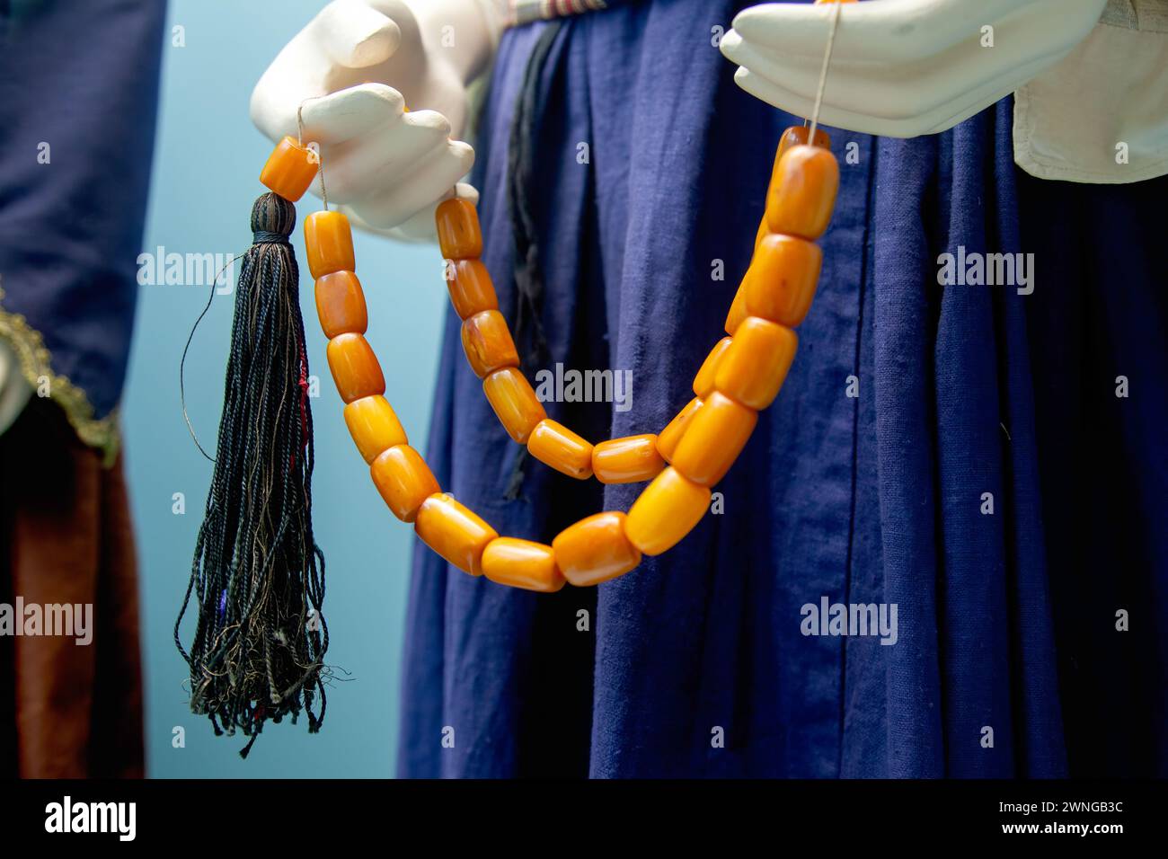 Worry beads (komboloi or kompoloi), a string of beads manipulated with one or two hands and used to pass time in Greek and Cypriot culture. Stock Photo