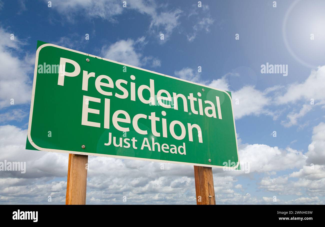 Presidential Election Just Ahead Green Road Sign Over Clouds and Blue Sky. Stock Photo