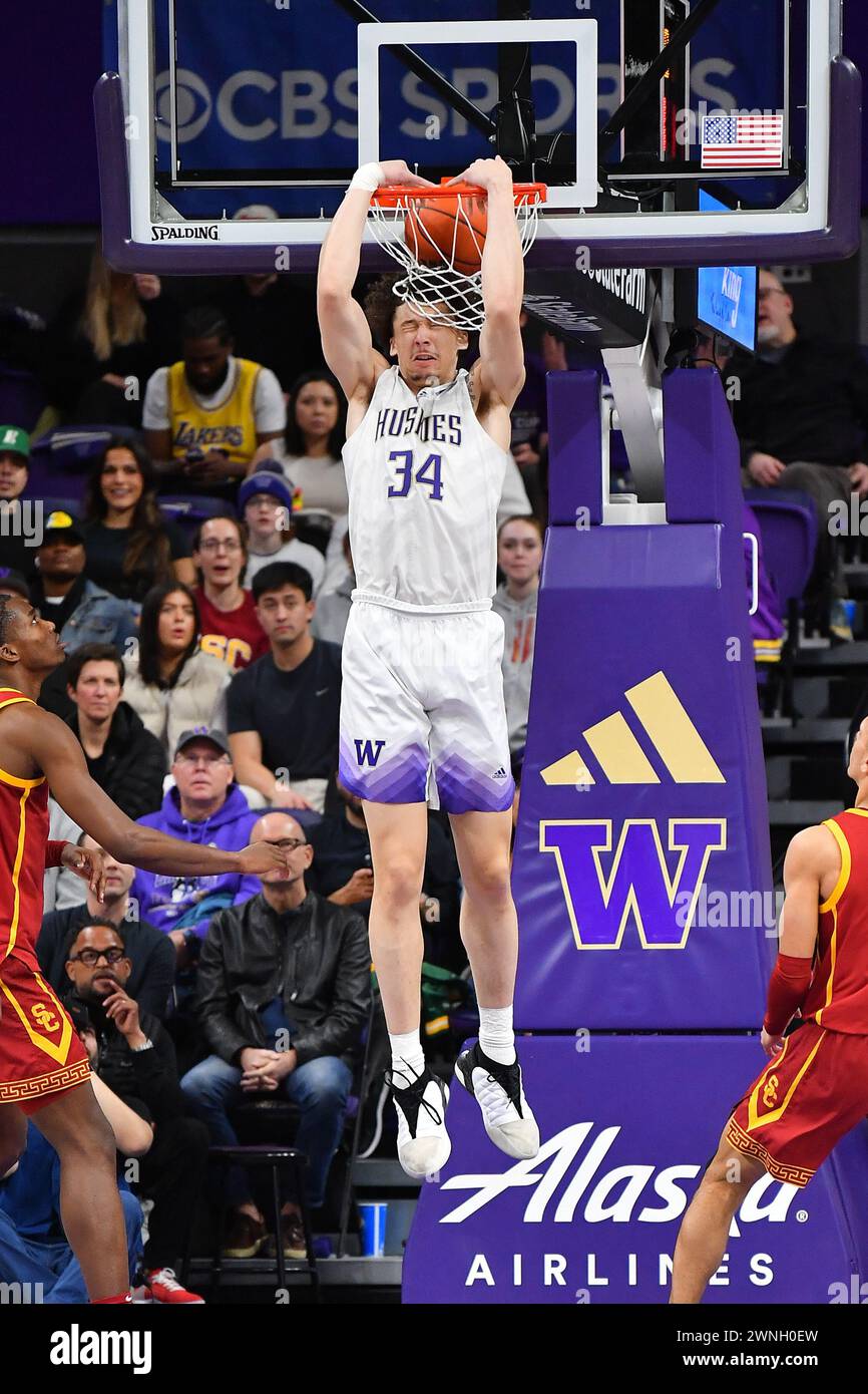 Seattle, WA, USA. 02nd Mar, 2024. Washington Huskies center Braxton Meah (34) gets a reverse dunk during the NCAA Basketball game between the UCSC Trojans and Washington Huskies at Hec Ed Pavilion in Seattle, WA. Steve Faber/CSM/Alamy Live News Stock Photo