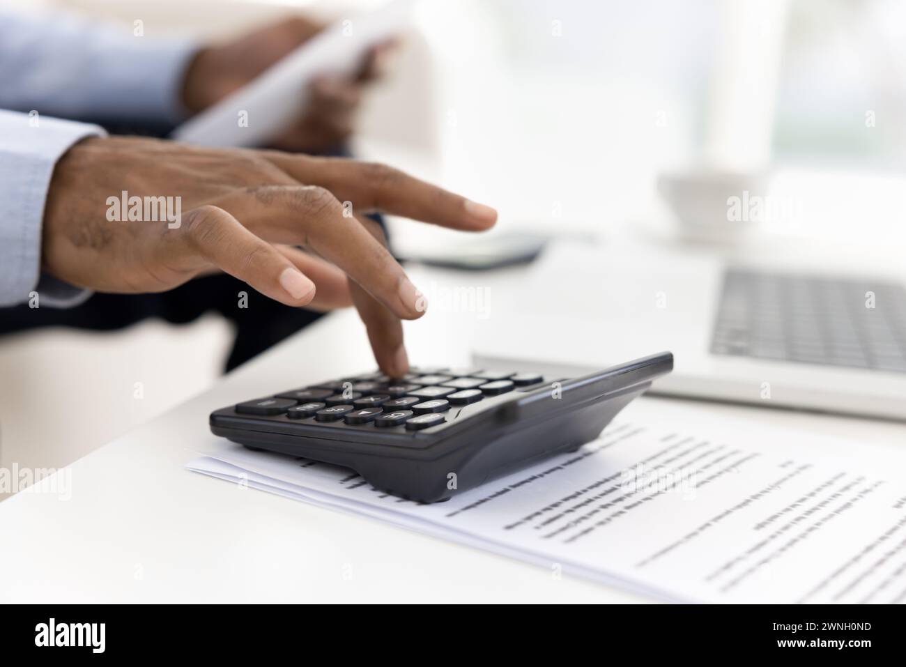 Manager Using Calculator Business manager with calculator hi-res stock photography and images ...