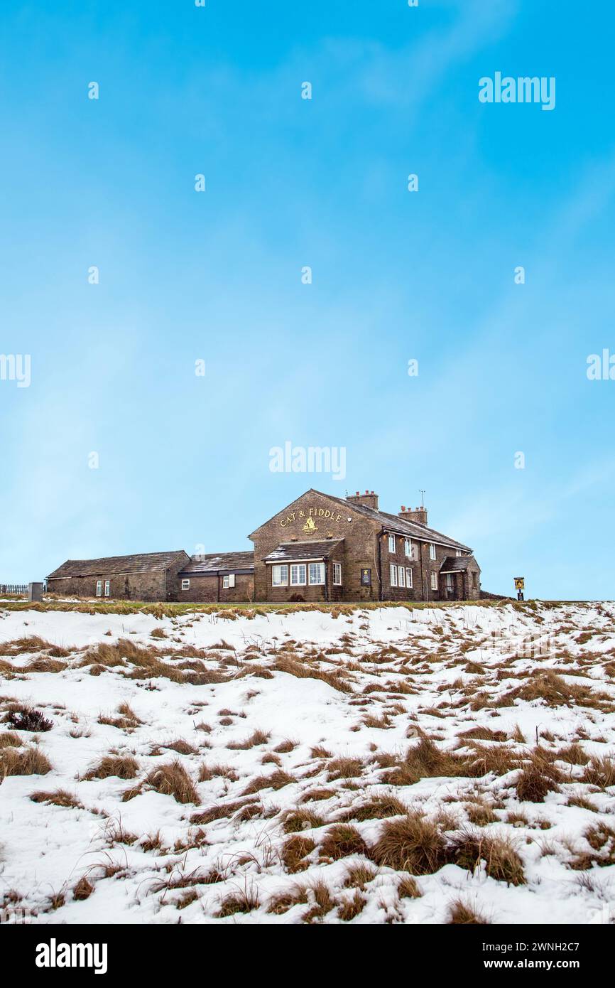 The Cat and Fiddle Forest Distillery seen from the snow covered Axe