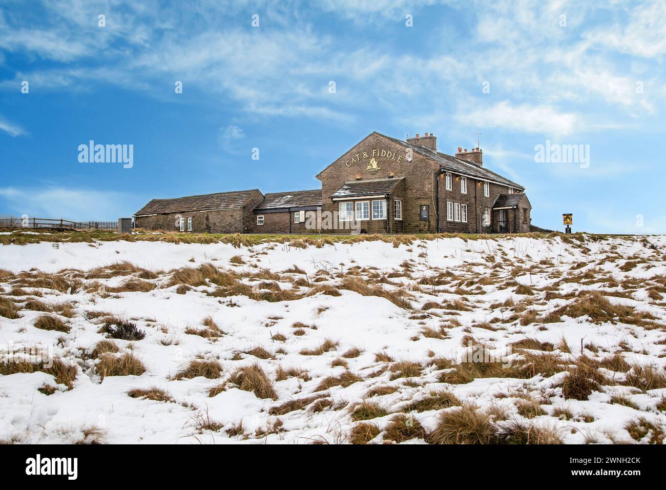 The Cat and Fiddle Forest Distillery seen from the snow covered Axe