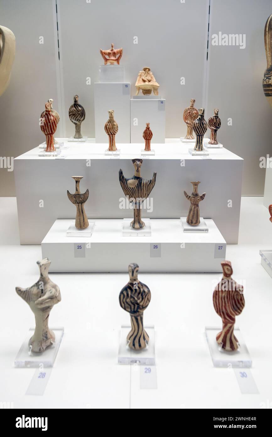 Cycladic clay figurines, a fine example of the ancient Greek culture, as exposed at the Archaeological Museum of Nafplio, Greece, Europe. Stock Photo