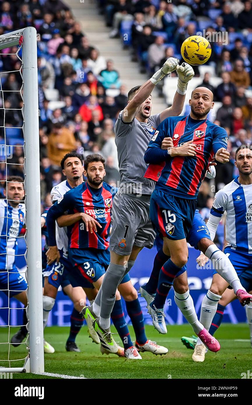 Barcelona, Spain. 02nd Mar, 2024. Ivan Martos (SD Huesca) and Joan Garcia (RCD Espanyol) during a La Liga Hypermotion match between RCD Espanyol and SD Huesca at Stage Front Stadium, in Barcelona, Spain on March 2, 2024. (Photo by Felipe Mondino/Sipa USA) Credit: Sipa USA/Alamy Live News Stock Photo