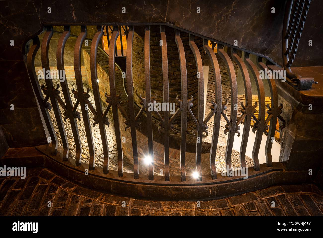 Wrought iron railing of the ramp that goes up from the basement to the ...