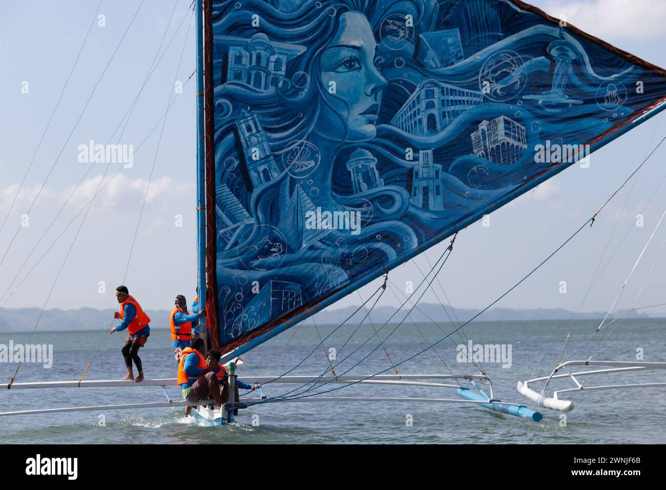 Iloilo, Philippines. 03rd Mar, 2024. Participants set up their sailboat