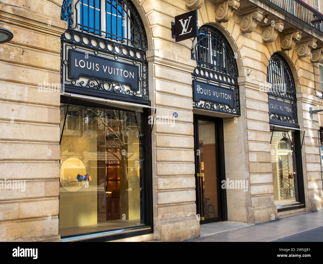 Bordeaux , France -  02 15 2024 : louis vuitton logo boutique facade and sign text facade entrance chain store brand shop Stock Photo