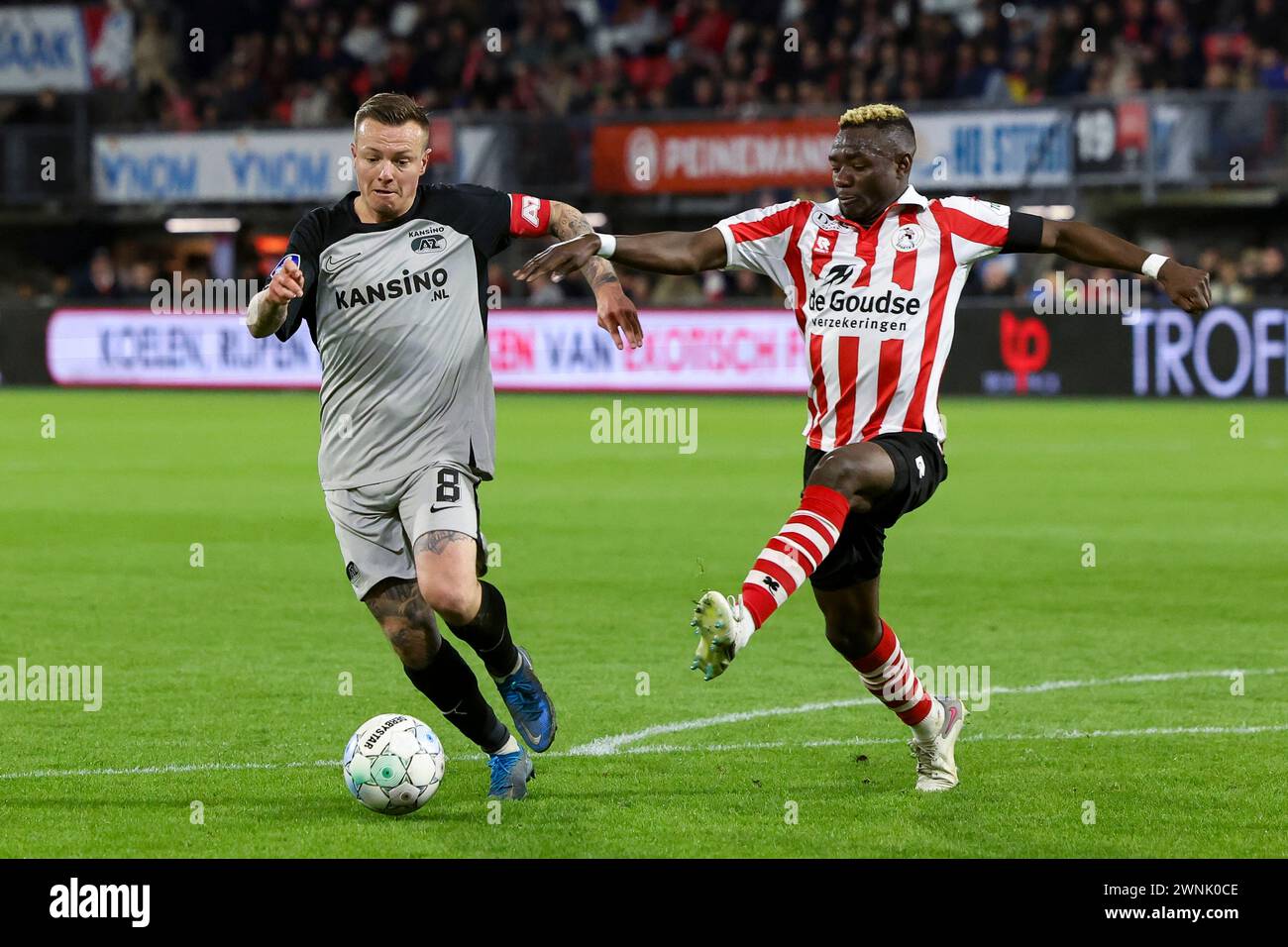 ROTTERDAM, NETHERLANDS - MARCH 2: Jordy Clasie (AZ Alkmaar) and Joshua Kitolano (Sparta Rotterdam) Battles for the ball during the Eredivisie match of Stock Photo