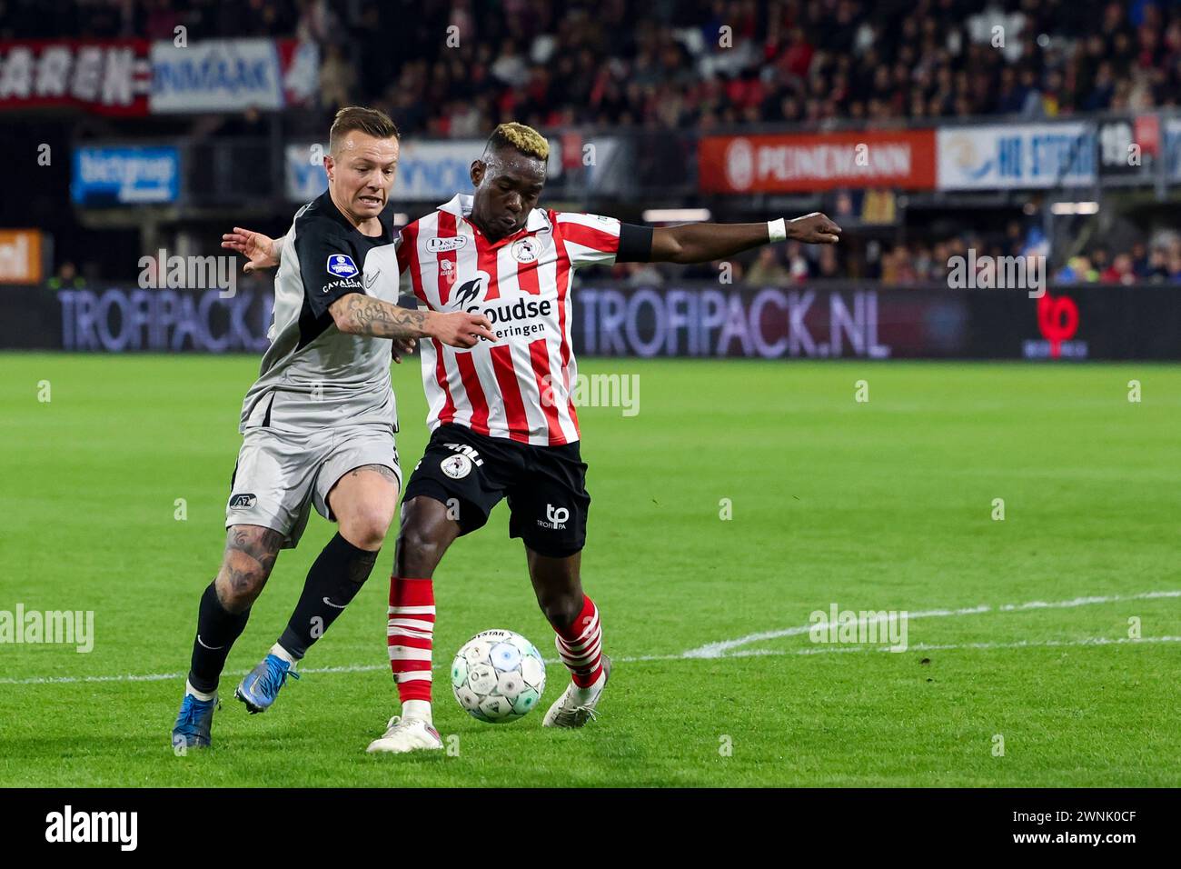 ROTTERDAM, NETHERLANDS - MARCH 2: Jordy Clasie (AZ Alkmaar) and Joshua Kitolano (Sparta Rotterdam) Battles for the ball during the Eredivisie match of Stock Photo
