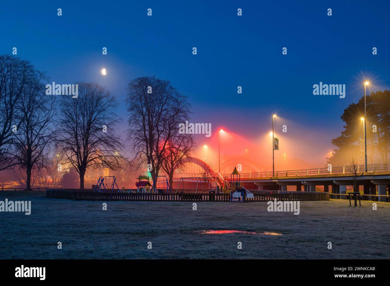 Evesham crown meadow and abbey bridge in the mist at dawn. Evesham