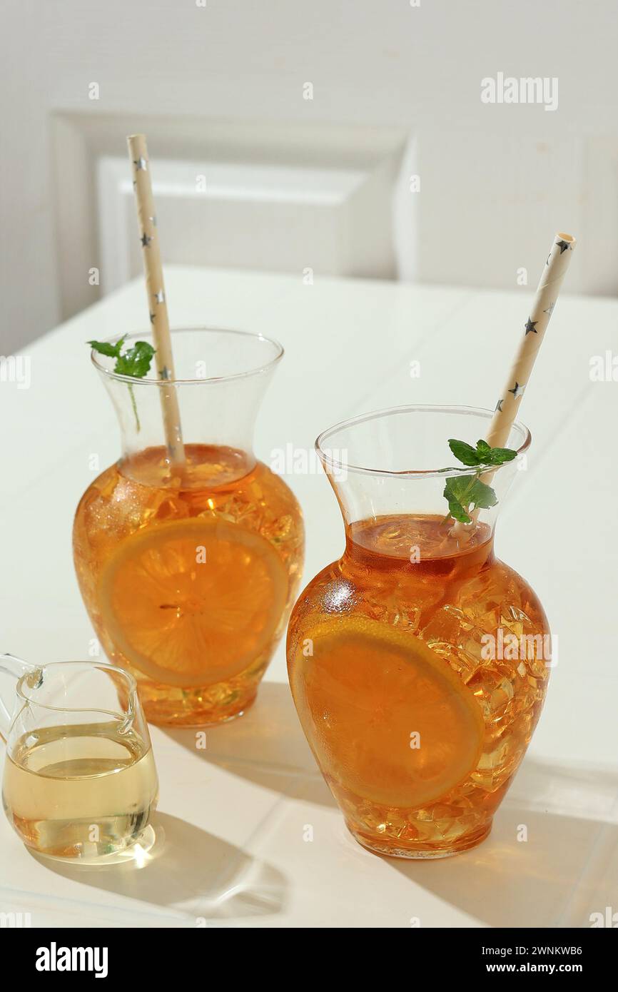 Sweet Ice Lemon  Tea Es Teh Manis with Liquid Sugar, Topping with Mint Leaf. Served on Carave Stock Photo