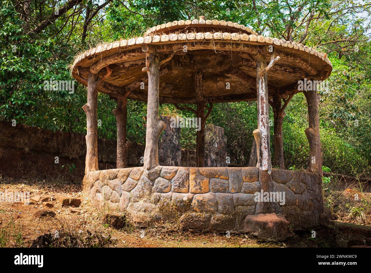Wooden pergola at a beautiful forest garden. Street photo, selective focus. Beautiful gazebo. Solid wood. Exterior Pergola. Pergola with water proof r Stock Photo