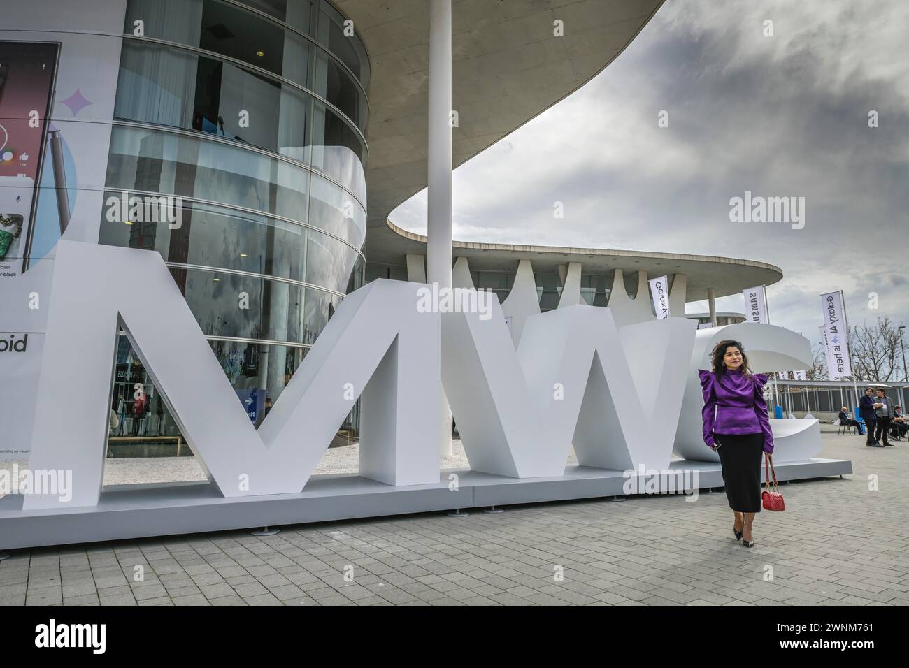 Visitor outside the exhibition centre, MWC Mobile World Congress 2024, Barcelona, Spain Stock Photo