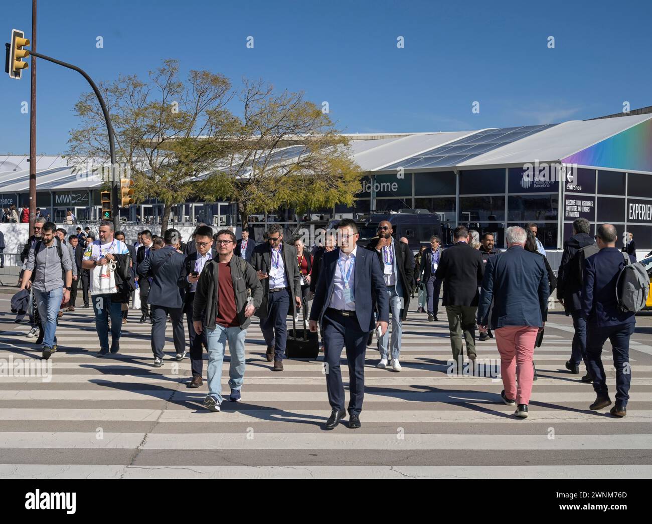 Visitors outside the exhibition centre, MWC Mobile World Congress 2024, Barcelona, Spain Stock Photo