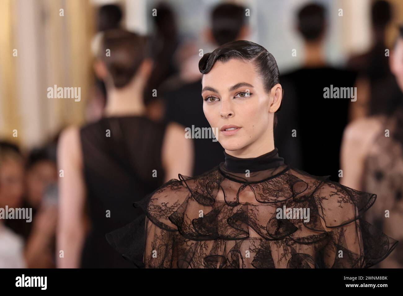 Vittoria Ceretti wears a creation as part of the Valentino Fall/Winter