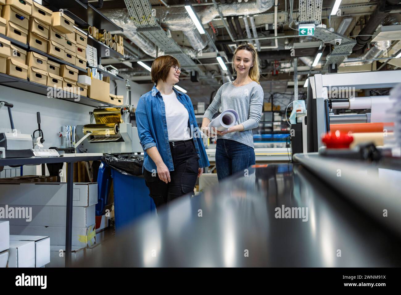 Professional female employees working in a printing house Stock Photo