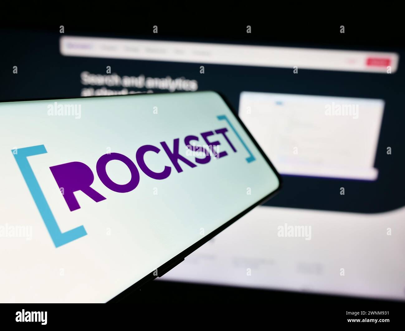 Smartphone with logo of American analytics database company Rockset Inc. in front of business website. Focus on left of phone display. Stock Photo
