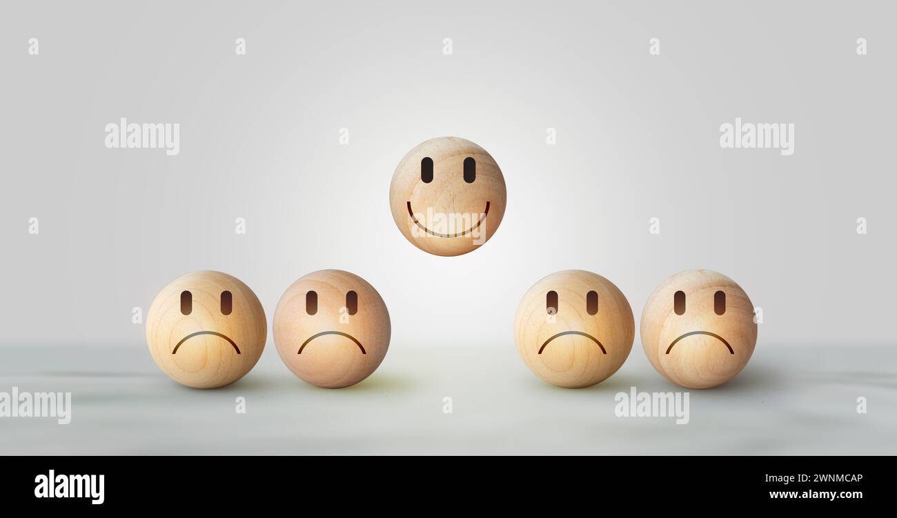 Smile icon wooden ball, sad face in dark. Mental health and emotional state concept, Smile face in bright side and sad face in dark side on wooden blo Stock Photo