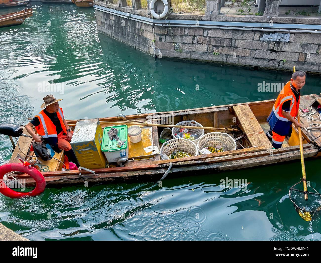 Suzhou, China, Chinese Workers, Cleaning Canal, Street Scenes, Old Town Historic Center Stock Photo