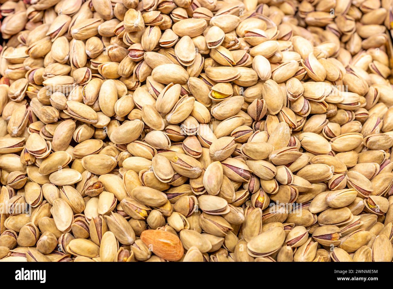 Tasty pistachios as background, and pistachios texture. Stock Photo