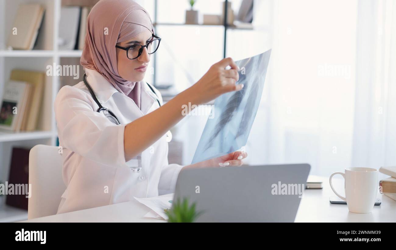 Radiology specialist doctor woman lungs xray desk Stock Photo Alamy