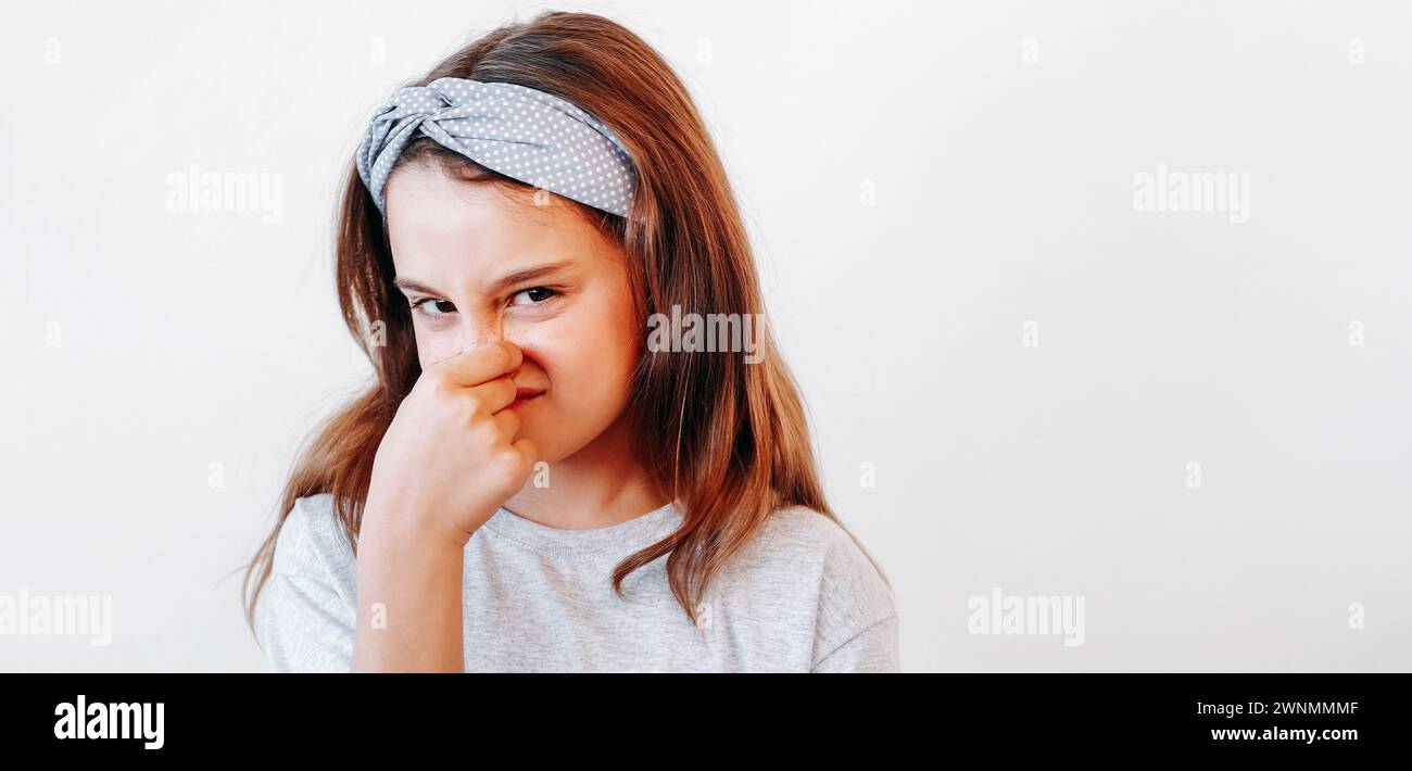 Disgusted child yuck kid dissatisfied little girl Stock Photo