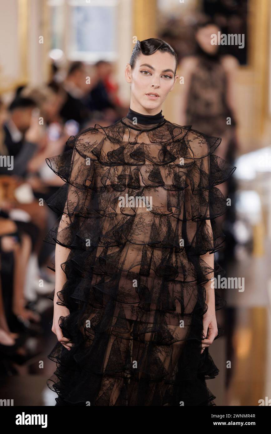 Vittoria Ceretti wears a creation as part of the Valentino Fall/Winter