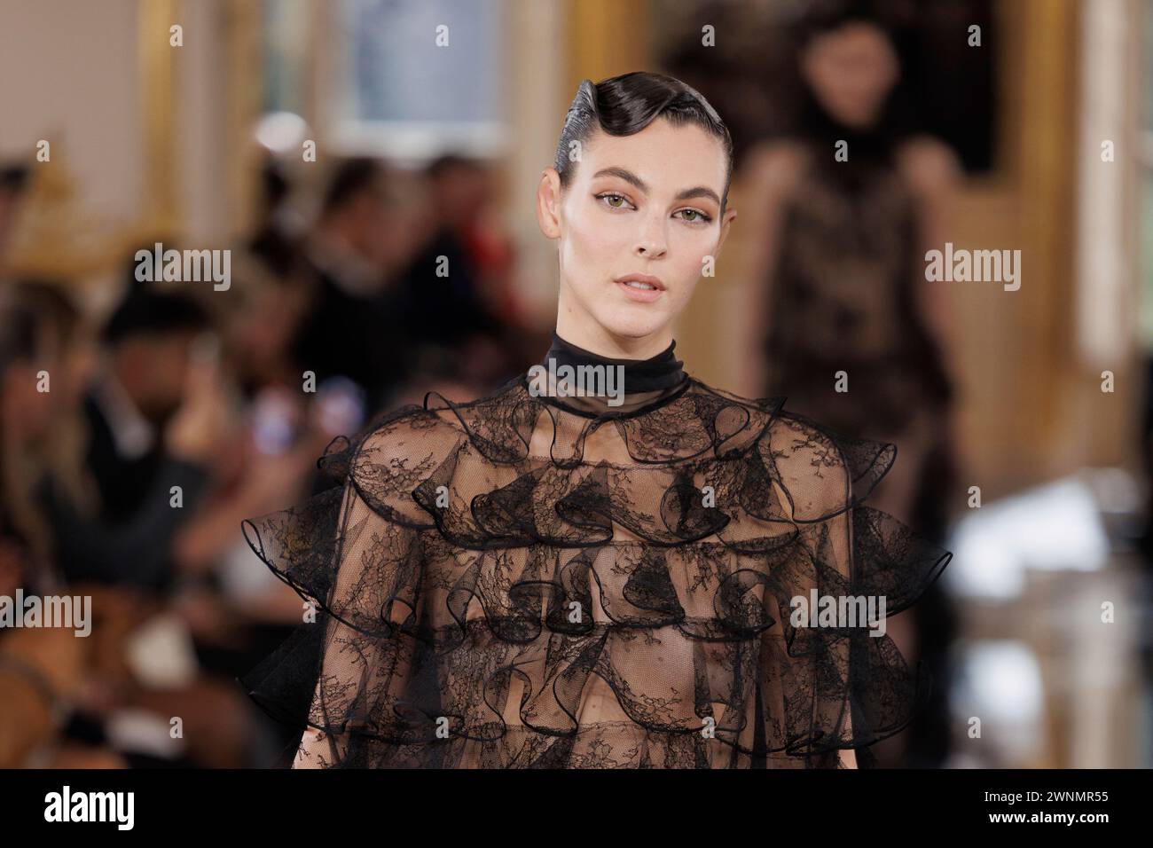 Vittoria Ceretti wears a creation as part of the Valentino Fall/Winter