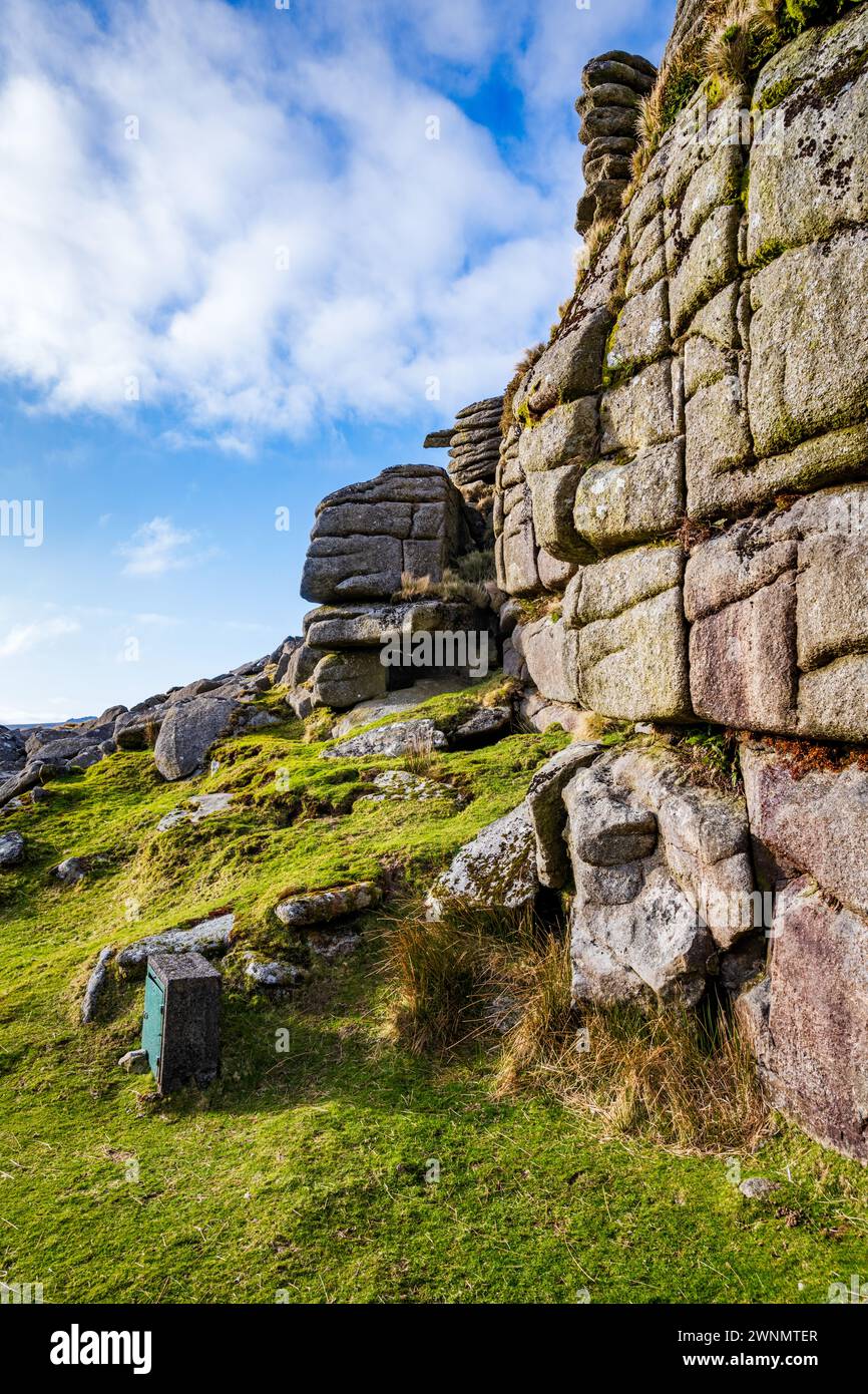 Sheer wall of a granite outcropping on East Mill Tor, Dartmoor National Park, Devon, England, UK Stock Photo