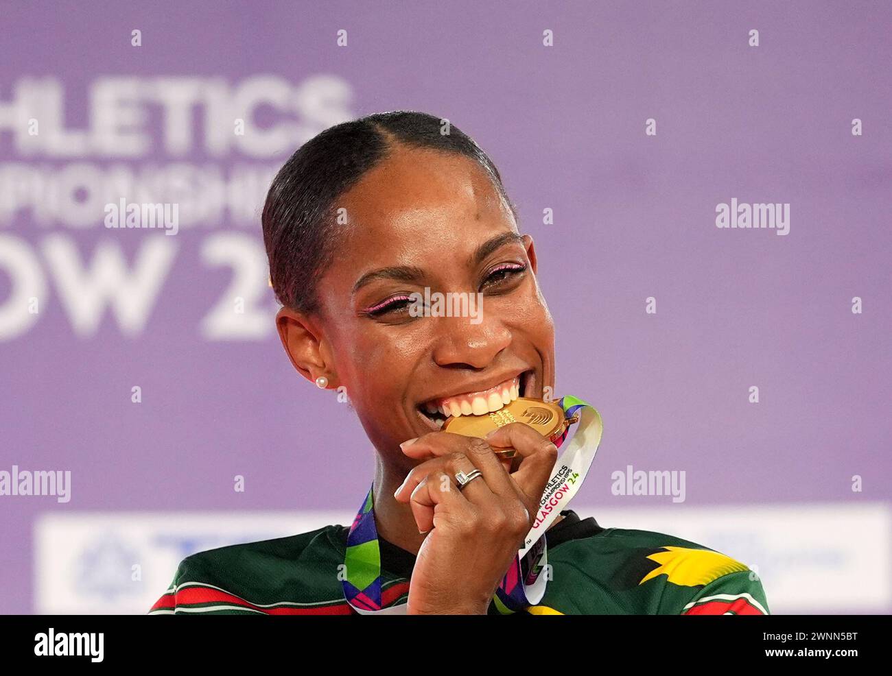 Commonwealth of Dominica's Thea LaFond celebrates gold on the podium