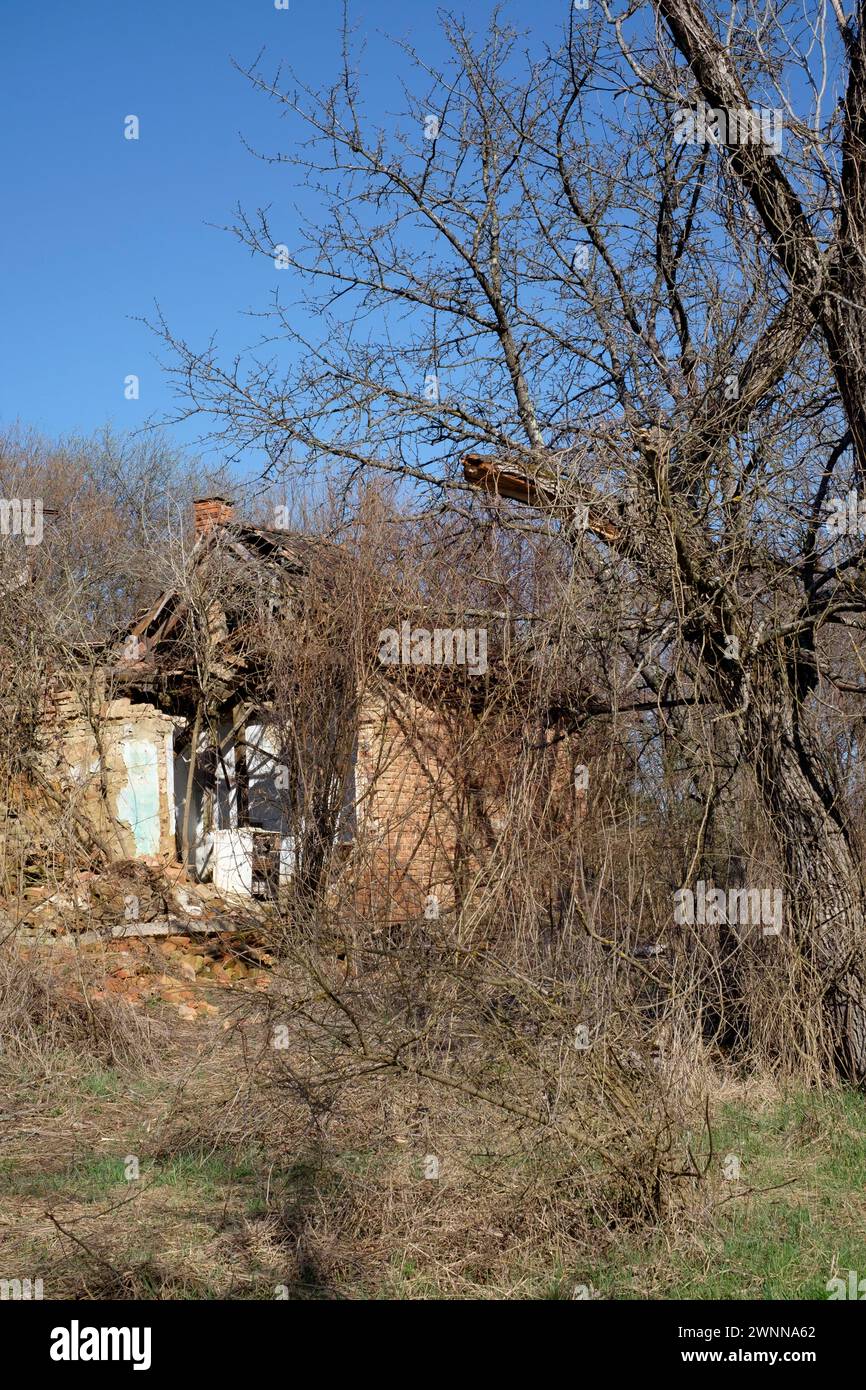 exterior view derelict abandoned wreck of crumbling collapsing rural ...