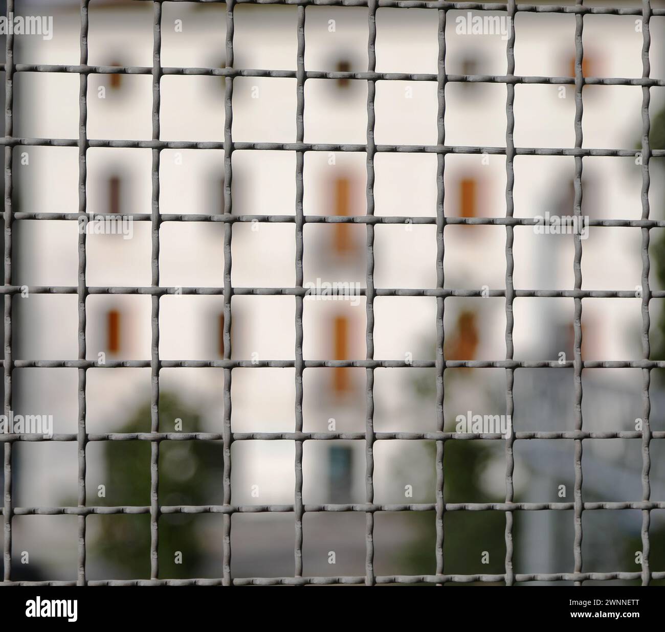 metal fence separating the border and the building intentionally ...