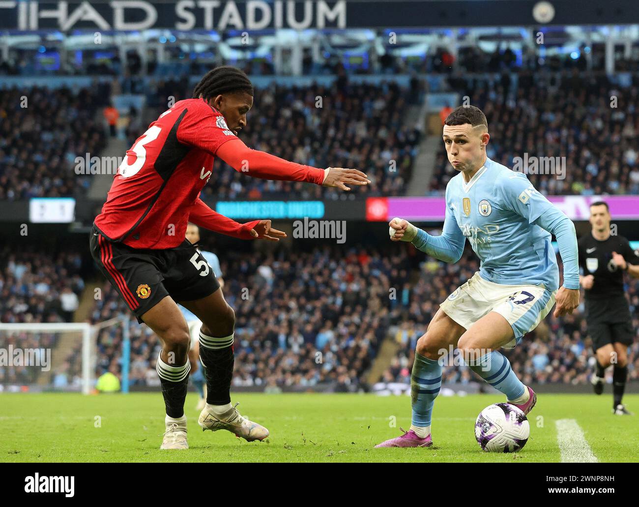 Etihad Stadium, Manchester, UK. 3rd Mar, 2024. Premier League Football, Manchester City versus Manchester United; Phil Foden of Manchester City takes on Willy Kambwala of Manchester United Credit: Action Plus Sports/Alamy Live News Stock Photo