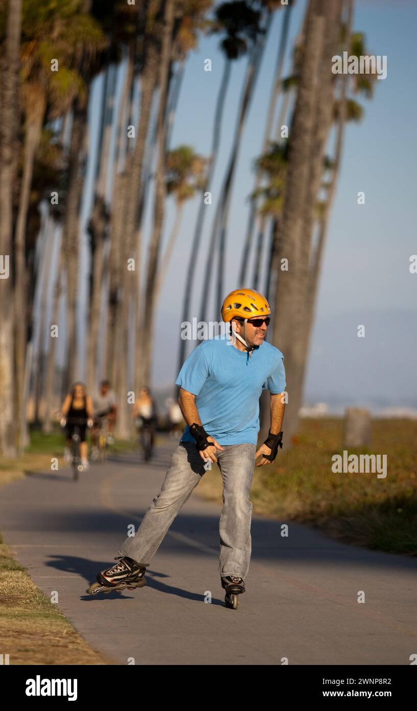 The boardwalk in Santa Barbara, California runs adjacent to the beach along Cabrillo Blvd and offers exercise, art and places to relax. Stock Photo