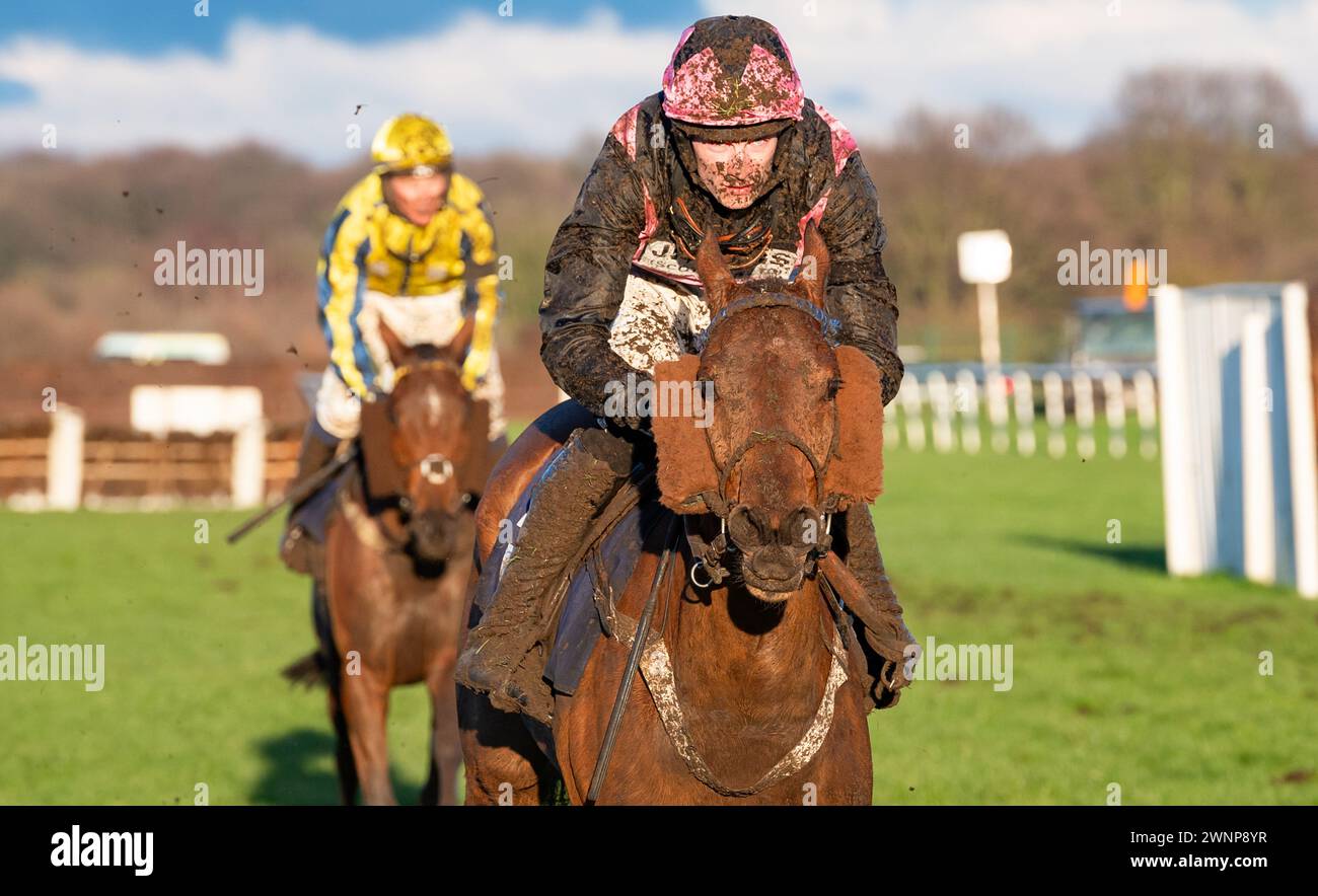 Collingham and Theo Gillard return mud-splattered after racing at Doncaster Racecourse, 02/03/2024. Credit JTW Equine Images / Alamy. Stock Photo