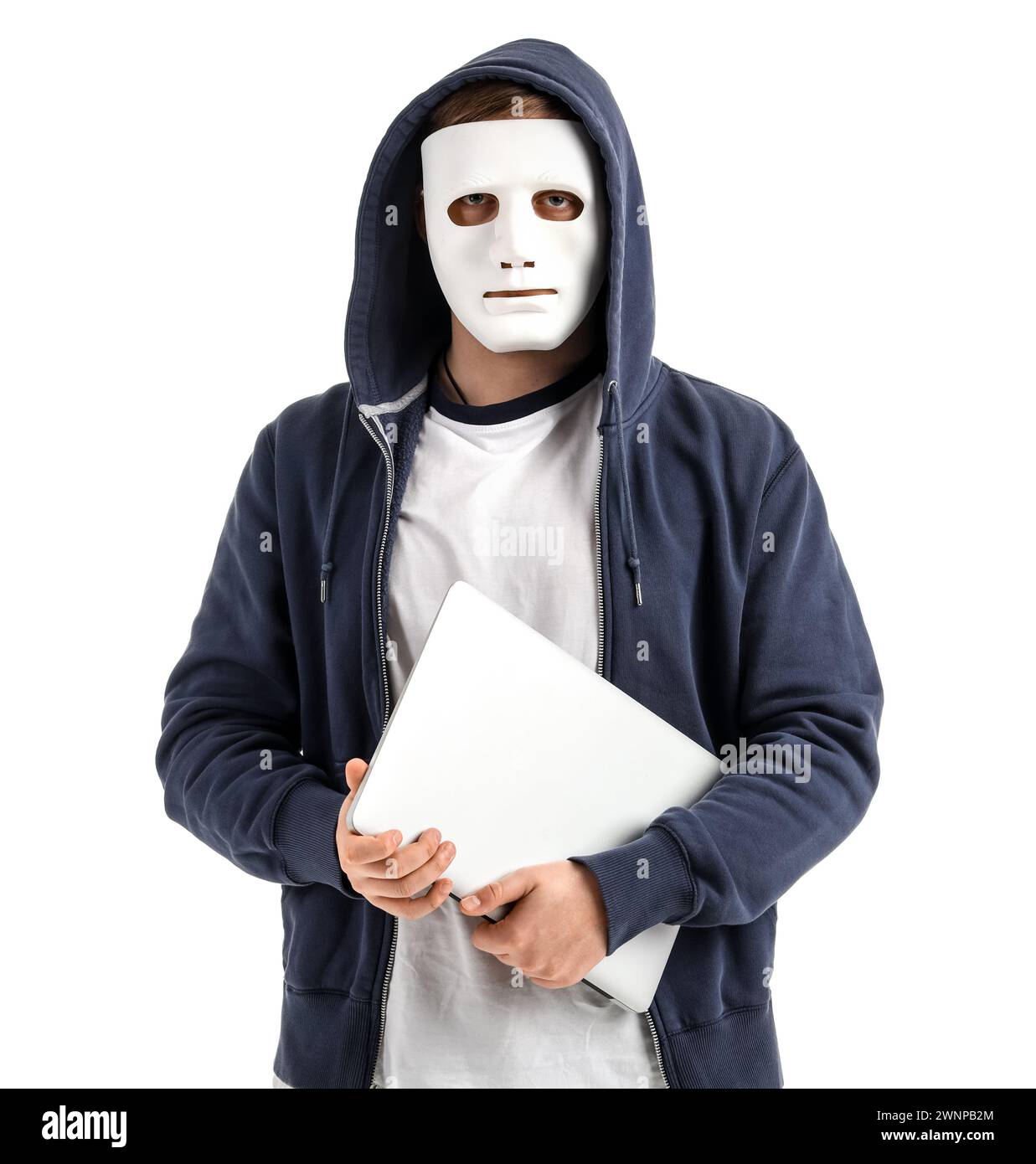 Hacker in mask with laptop on white background Stock Photo