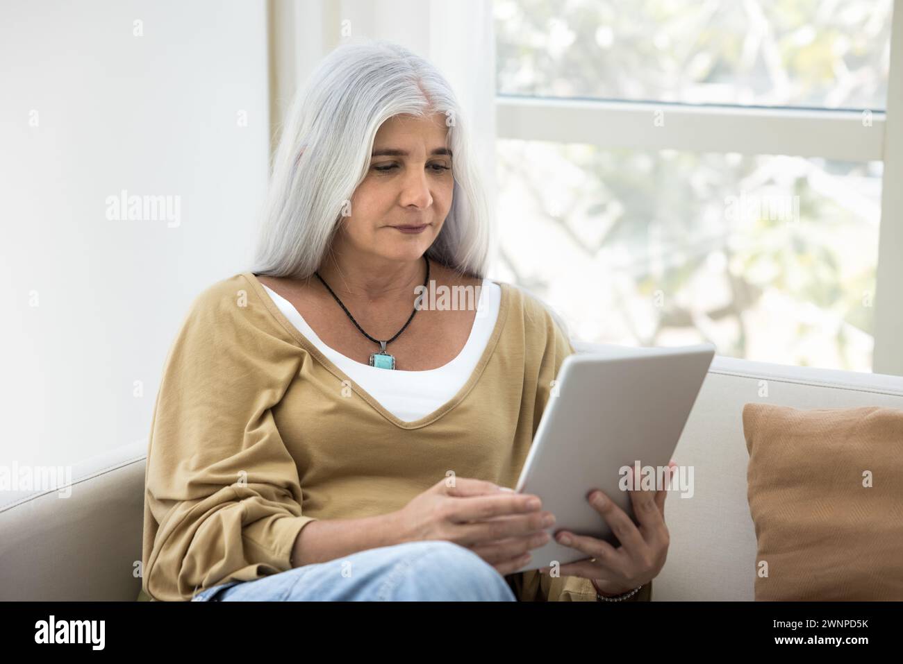 Serious grey haired older latin hi-res stock photography and images - Alamy