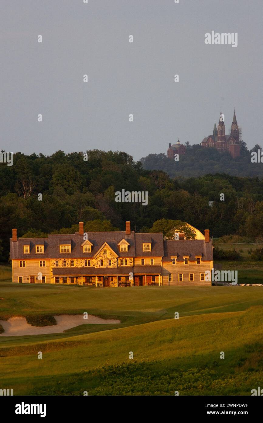 View of the Erin Hills Golf Course clubhouse from the 18th hole with Holy Hill Catholic Monastery looming in the background. Please send licensing req Stock Photo