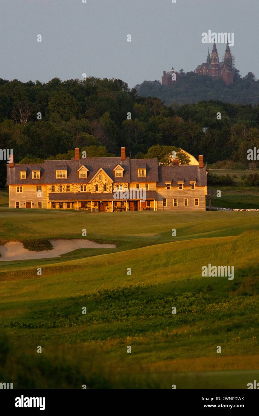 View of the Erin Hills Golf Course clubhouse from the 18th hole with Holy Hill Catholic Monastery looming in the background. Please send licensing req Stock Photo