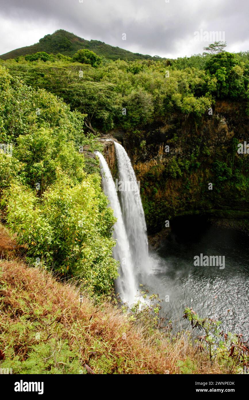 Wailua Falls plunges 173 feet into a pool of water on the island of ...