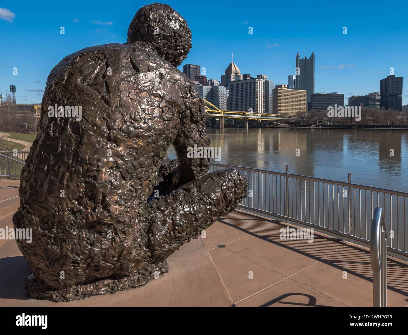 A bronze statue of Mr Rogers on the Allegheny River, overlooking downtown Pittsburgh