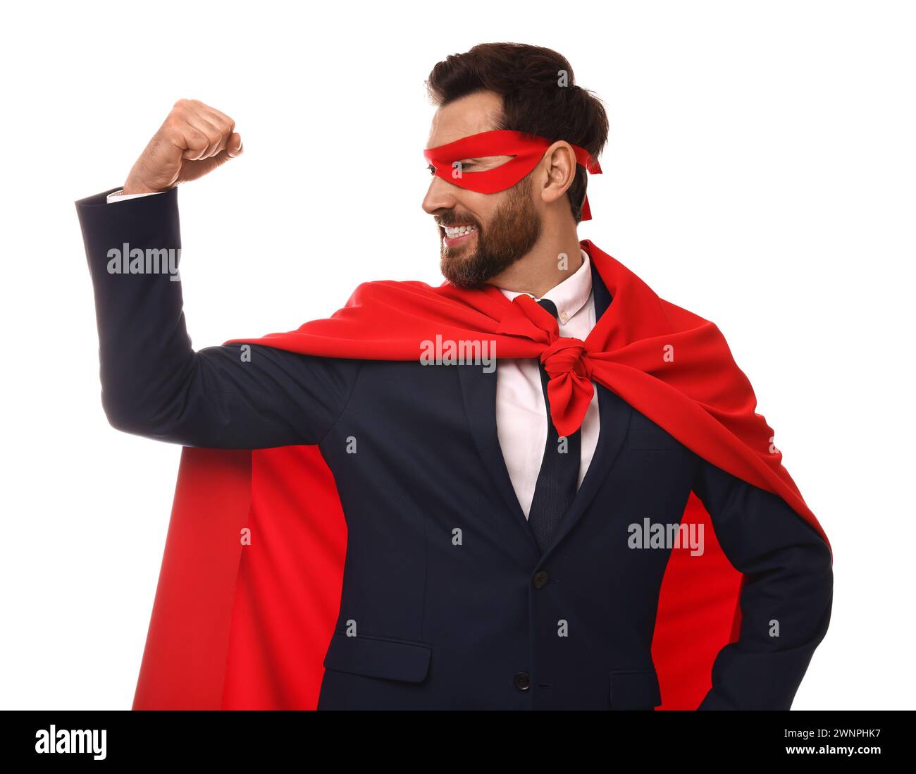 Happy businessman wearing red superhero cape and mask on white ...