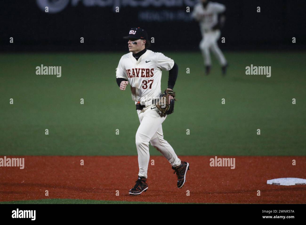 Oregon State infielder Travis Bazzana (37) runs in during an NCAA