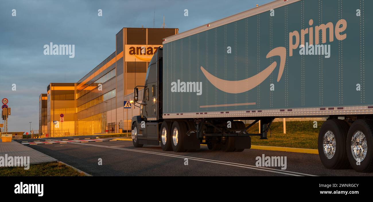 Mack Anthem with Amazon trailer at logistics centre Stock Photo