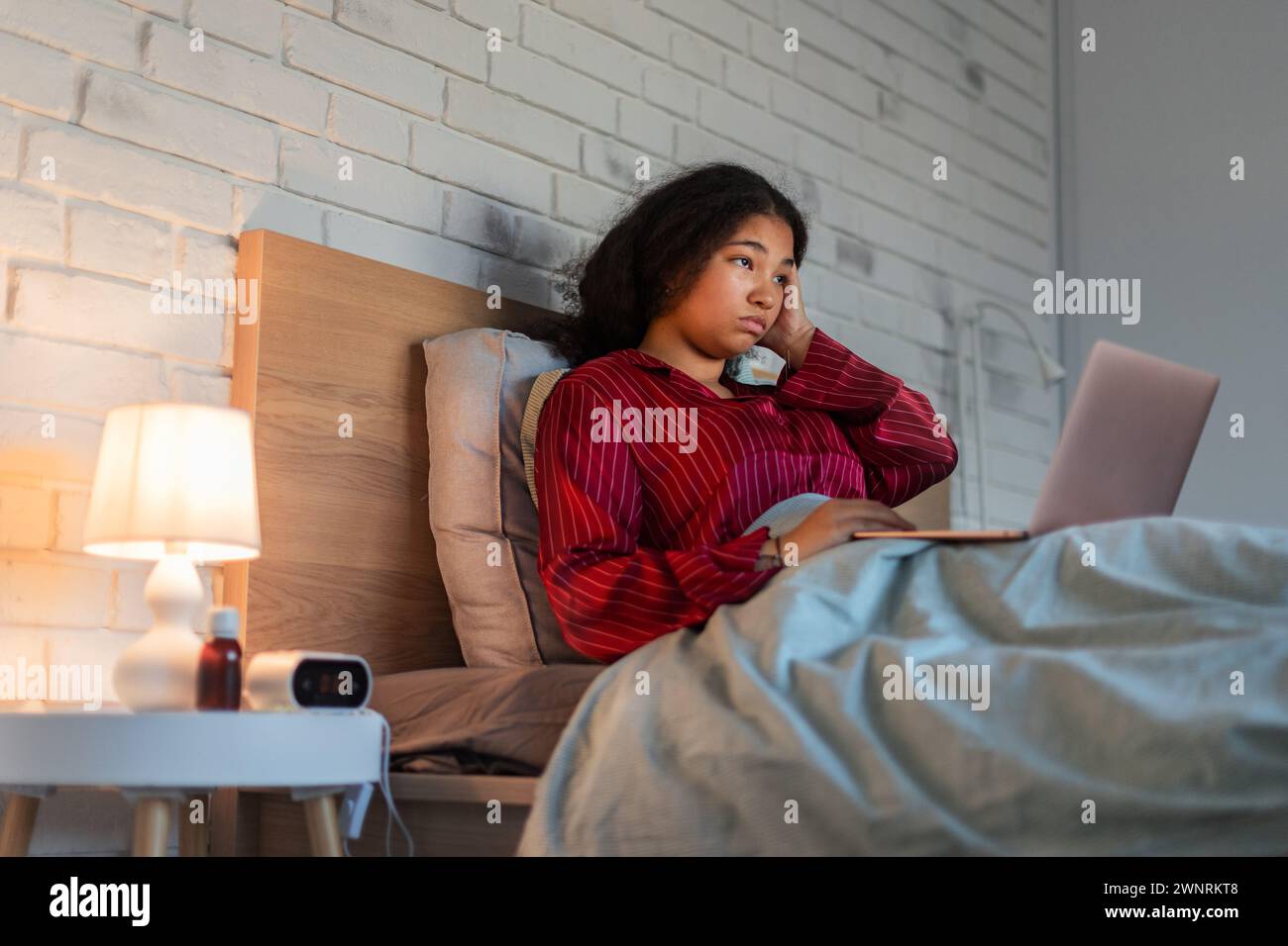 Woman can't fall asleep, insomnia a sleep problems. Concept of sleep routine and techniques for better sleep. World Sleep Day. Stock Photo