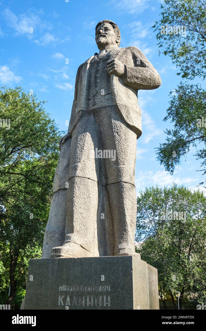 A stone, marble statue of the leader, Mikhail Kalinin. The Muzey Pamyatnikov Sovetskoy Skul'ptury in the Square of Sary-Arka of Family Park in Almaty, Stock Photo