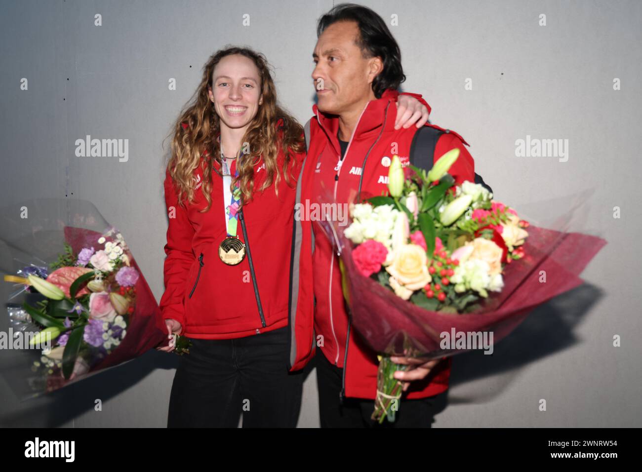 Belgian Noor Vidts and Belgian athletics coach Olivia Fernando pose for the photographer at the arrival of the athletes returning from the World Athletics Indoor Championships in Glasgow, Scotland, UK, at Charleroi Brussels South Airport, in Charleroi, on Sunday 03 March 2024. Belgium won three gold medals and one bronze medal at the World Championships Indoor. BELGA PHOTO VIRGINIE LEFOUR Stock Photo