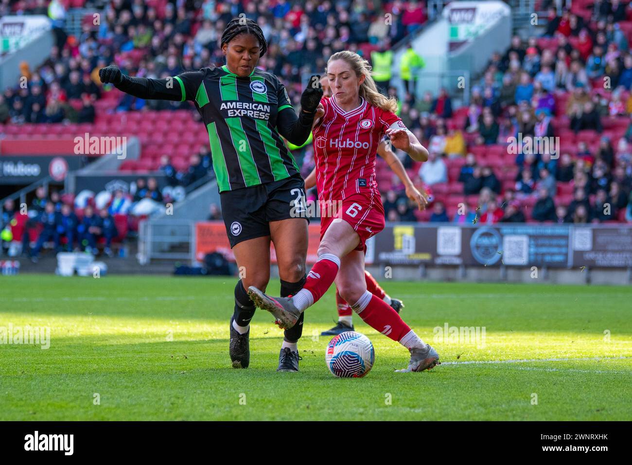 Bristol. UK. 3 March, 2024. Captain Megan Connolly for Bristol City puts in a tackle on Madison Haley for Brighton. Credit: Shell Lawrence Photography/Alamy Live News Stock Photo